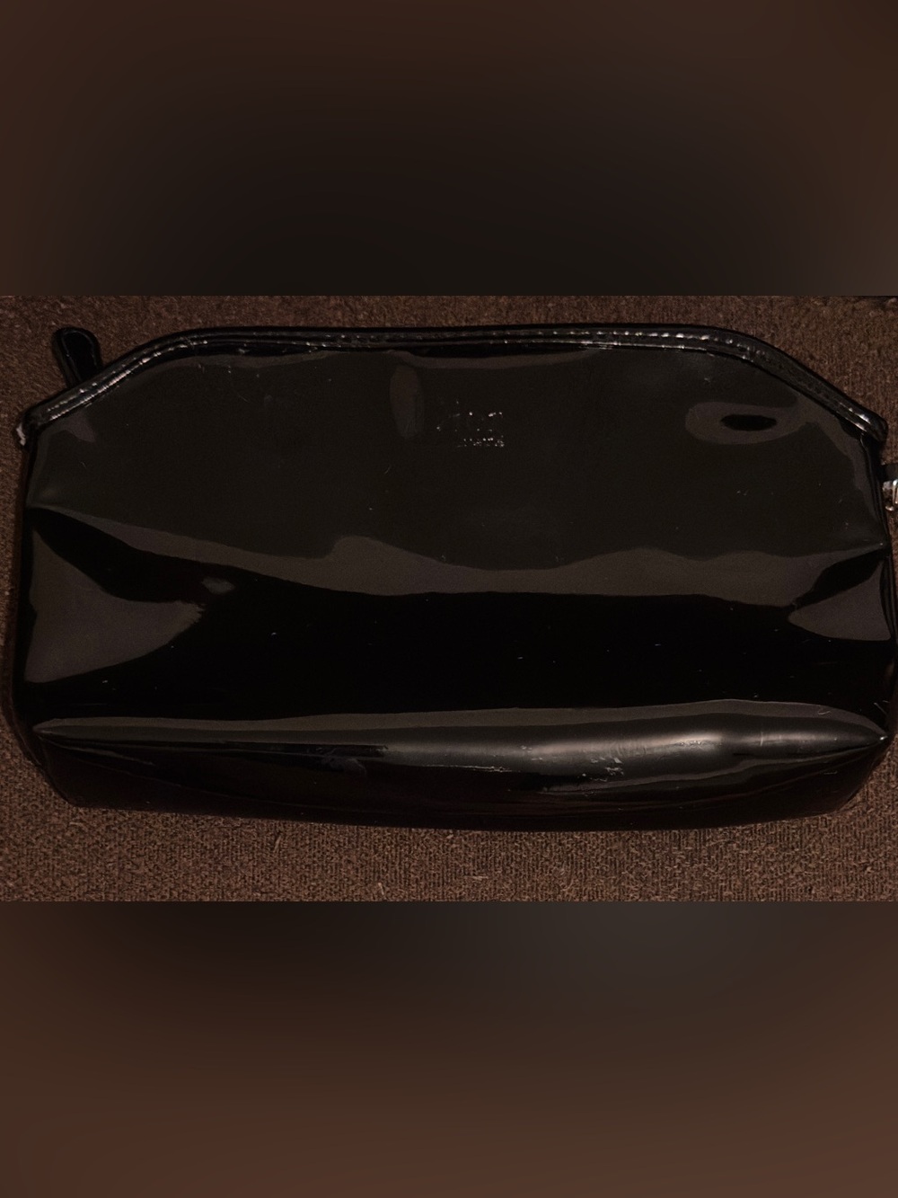 Dior Black Patent Leather makeup bag. 9”W x 5”H. Good condition.